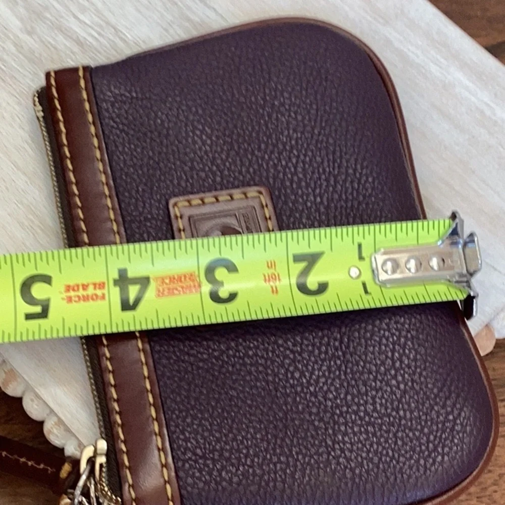 Dooney & Bourke pebbled deep purple and Brown Leather Wristlet, keychain